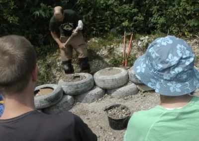Earth tyre brick wall workshop