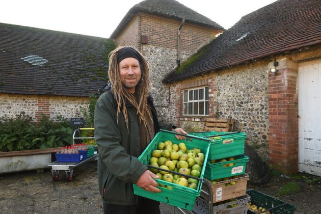 Stephan with crate of Apples
